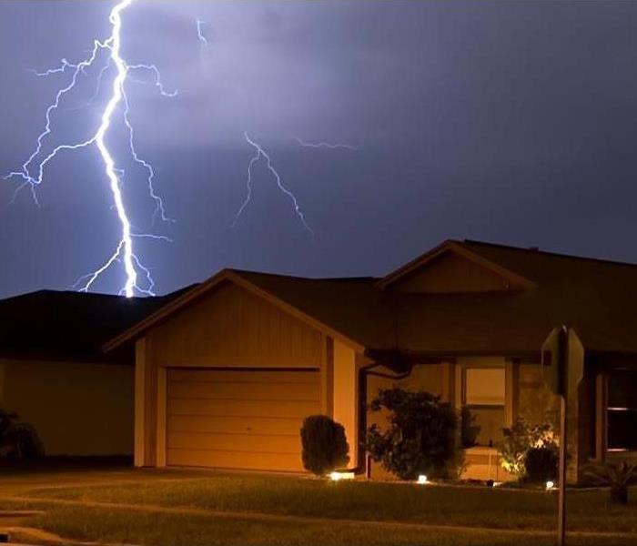 Florida home in the middle of a severe storm with lighting 